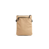 Mueslii crossbody, made of PU coated waterproof nylon color sand, back view.