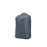 Mueslii small backpack,  made of  water resistant canvas nylon,  with a laptop compartment, color slate grey, side view.
