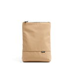 Mueslii light backpack,  made of PU coated waterproof nylon, with a laptop compartment, color sand, front view.