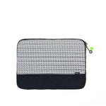 Mueslii 16" padded laptop sleeves made of rip stop nylon and Ykk zips, color chequered, front view.
