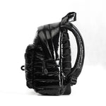 Mueslii original puffer extra small pack made of high density nylon and Ykk zips, color black, side view.
