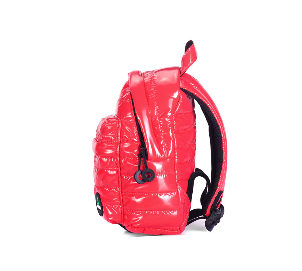 Mueslii original puffer extra small pack made of high density nylon and Ykk zips, color pink red, side view.